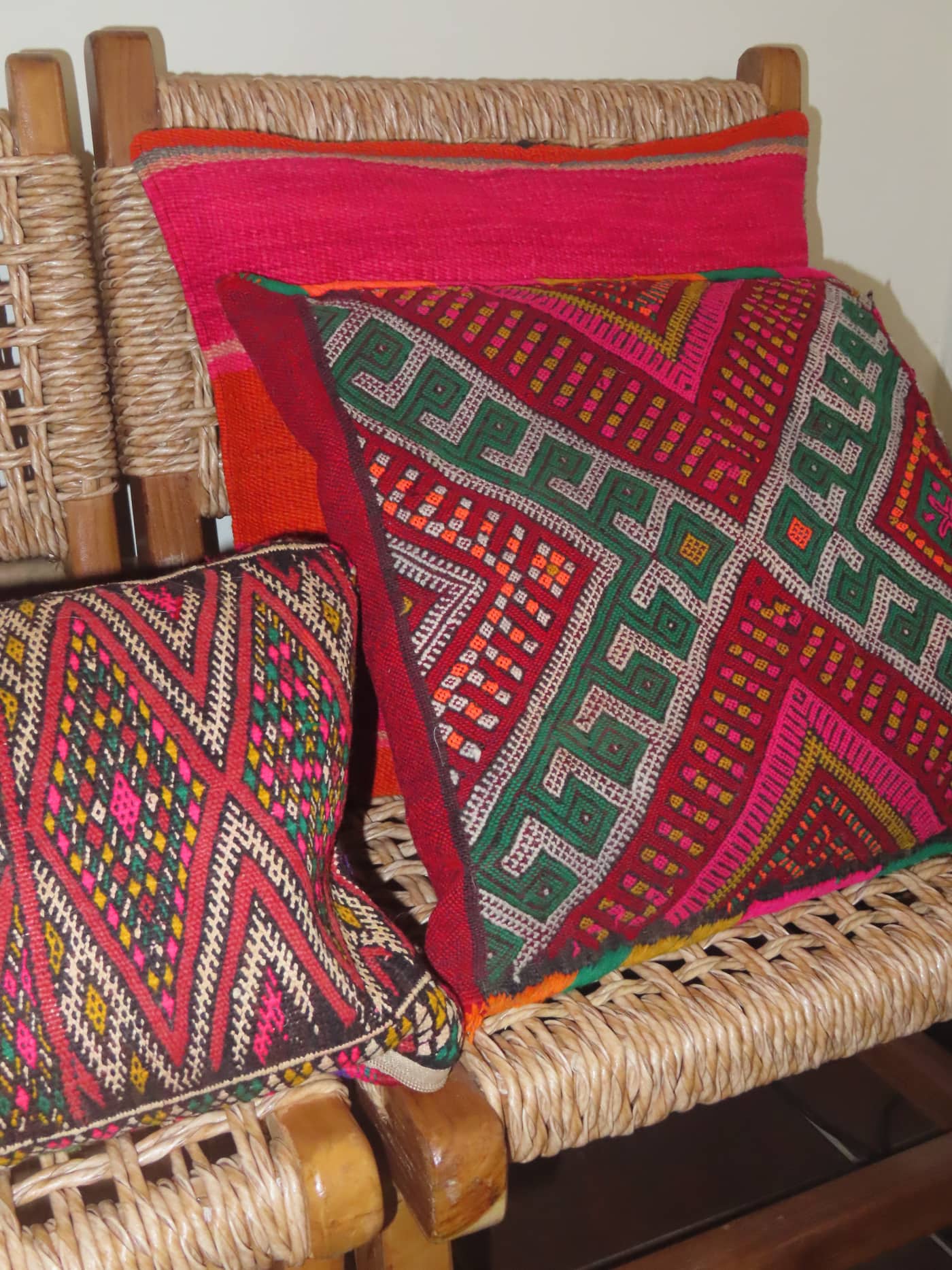 Kilim cushion on a rattan chair